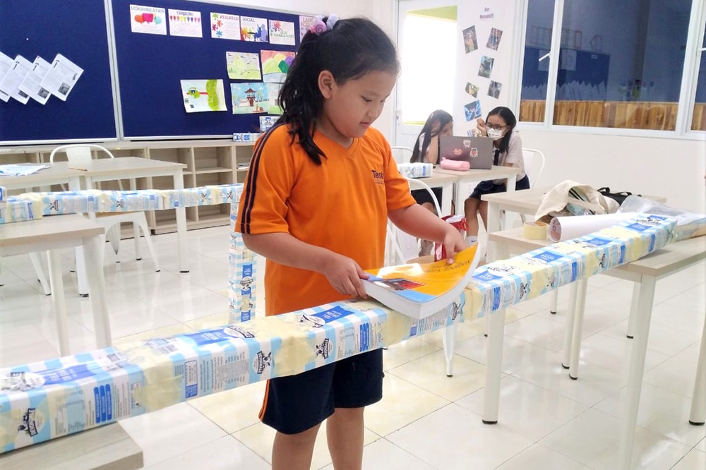 truong quoc te tesla recycle 1